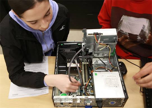 students working on computer